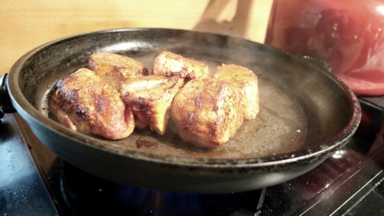 Pork fillet frying in the pan.