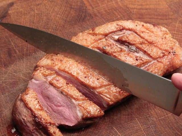 pink-crusty-roasted-duck-breast-sliced-edged