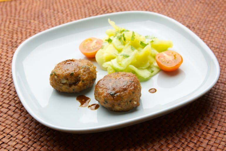 Meat patties or meatballs in Bavarian here with classic potato salad