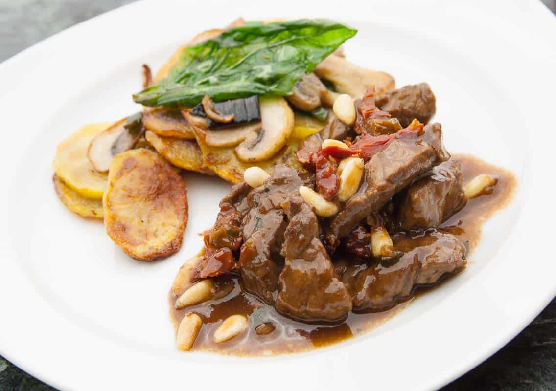 Veal liver-venetian-with tomato-pine nuts