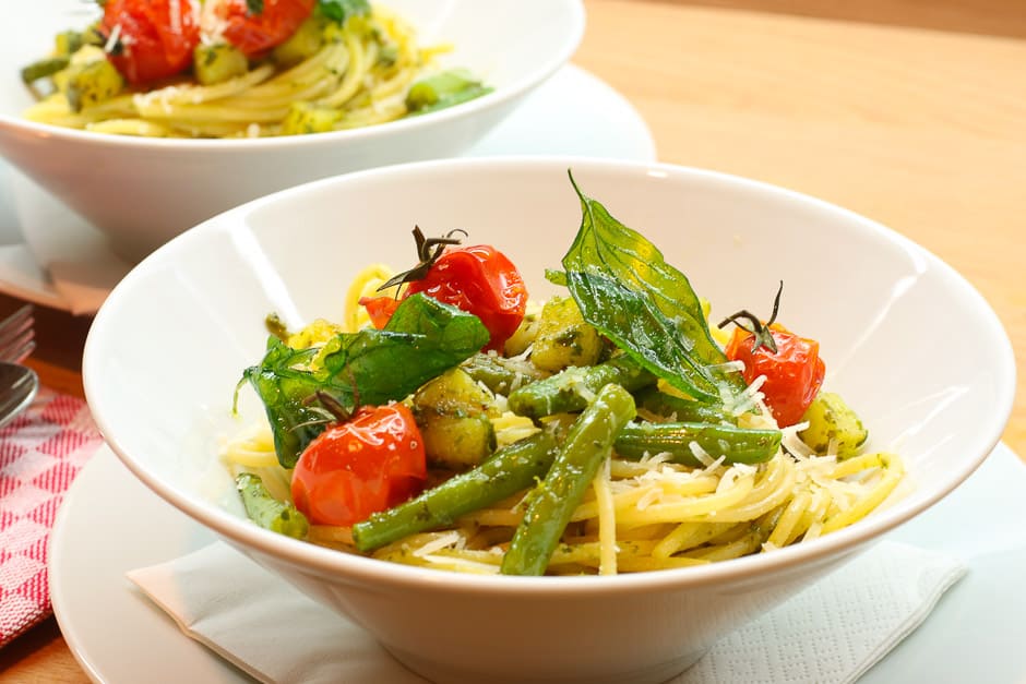 pasta-pesto-genovese with crunchy herbs and caramelized tomato