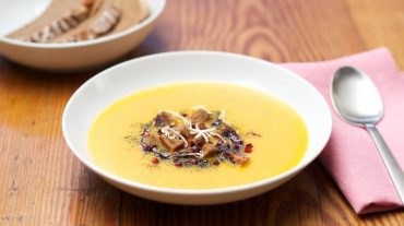 Styrian pumpkin soup with pumpkin seed oil, bread cubes, bacon and horseradish © thomas sixt bavarian chef and german food artist and food photographer