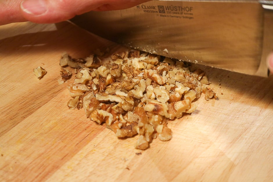 Chop walnuts with a knife