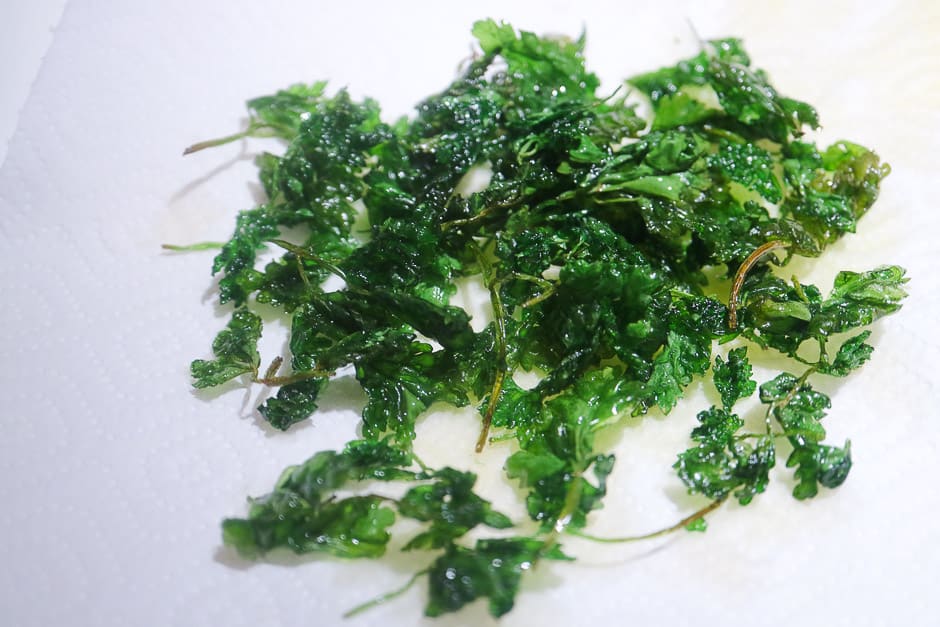 Fried parsley on paper towels