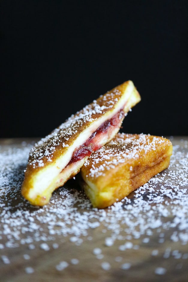 French toast arranged on a board vertical format food photo