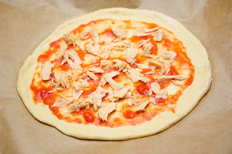 Tuna pizza topped with canned tuna.