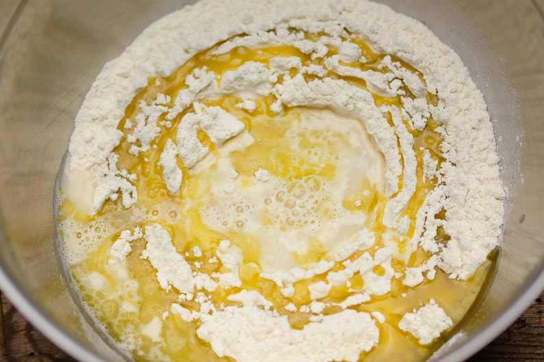 Yeast dough ingredients in a mixing bowl