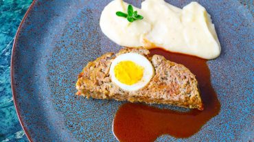 False hare or meat loaf recipe picture with sauce and mashed potatoes