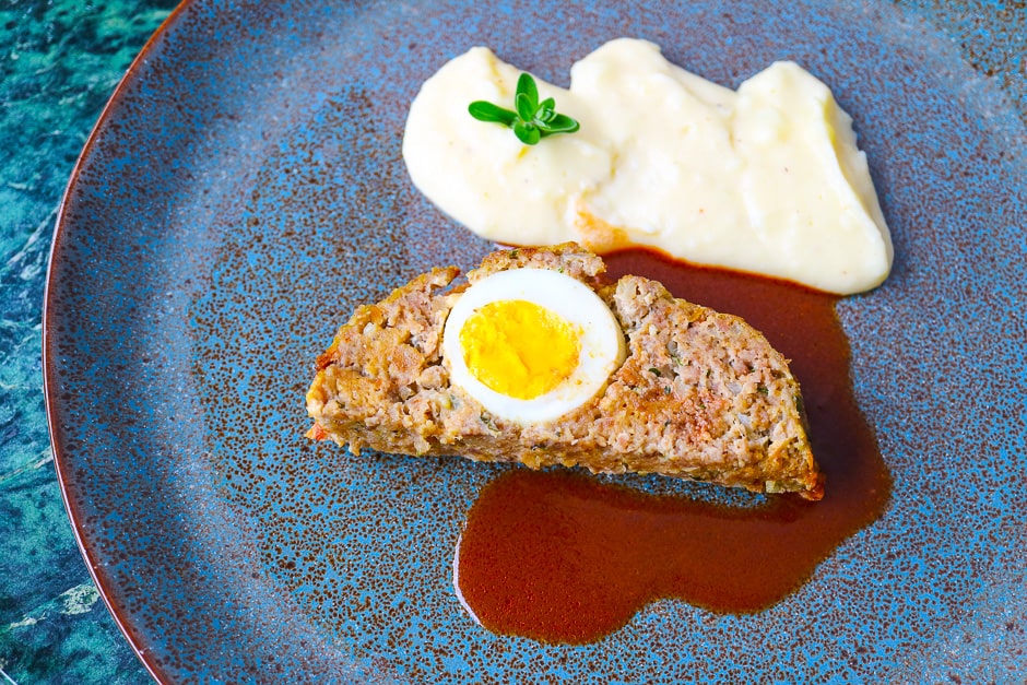 False hare or meat loaf recipe picture with sauce and mashed potatoes