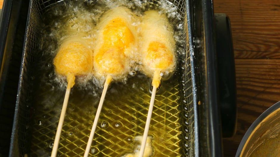 Fry the corn dogs in the deep fryer.