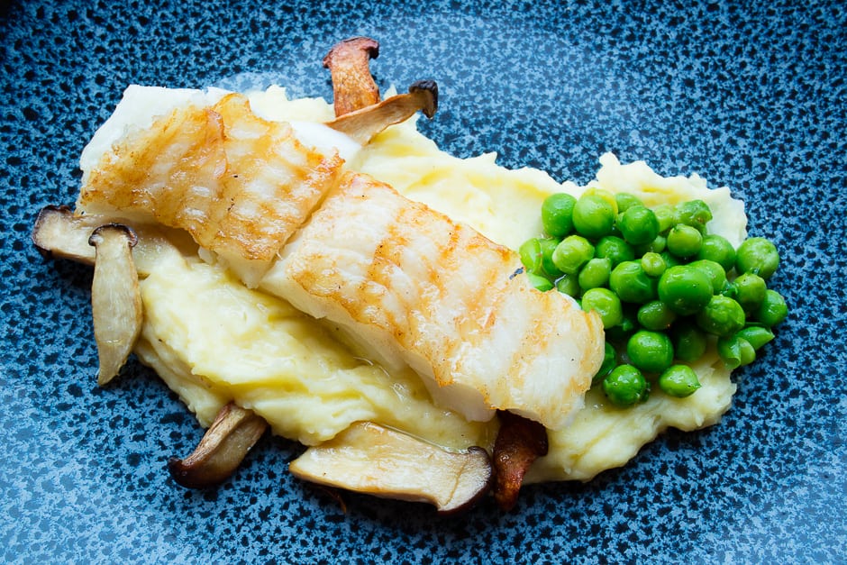 Halibut recipe picture with mashed potatoes, peas and mushrooms