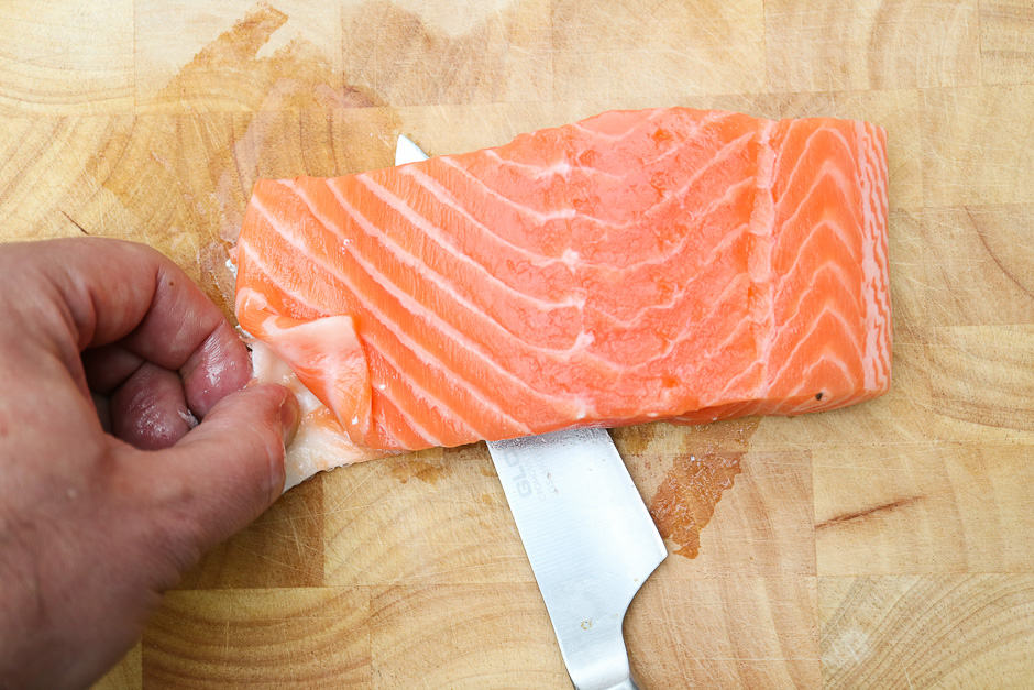 Cut off salmon skin.