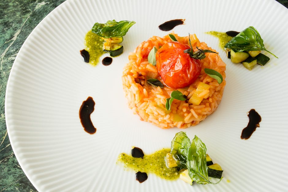 Tomato rice served as a vegetarian main course.