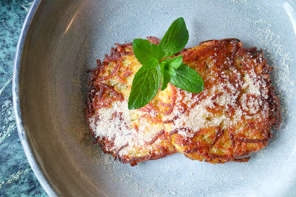 Potato pancakes with sugar and mint.