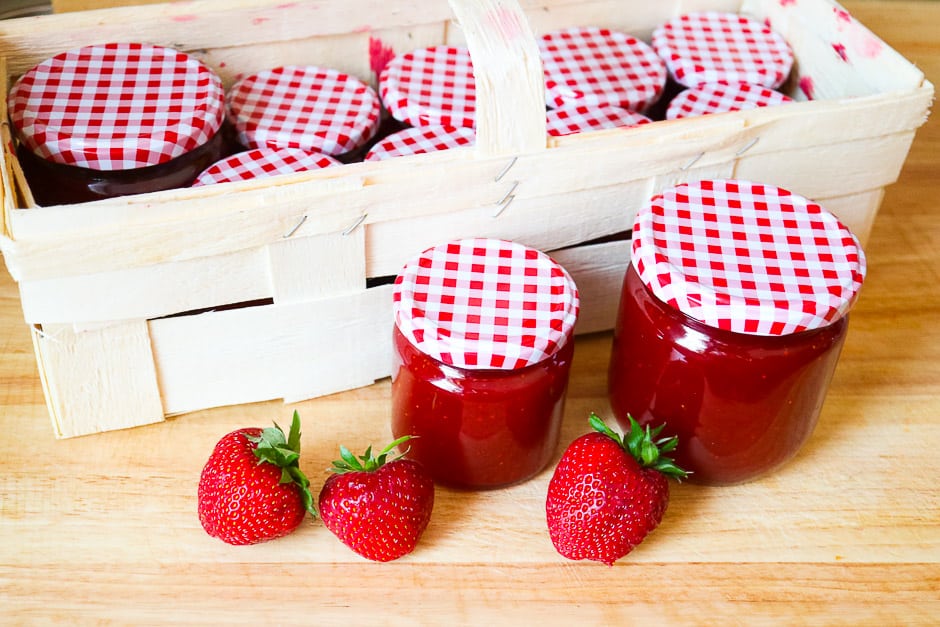 Strawberry jam jars with basket