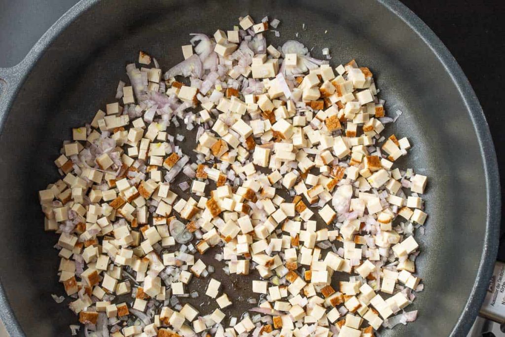 Add the tofu and shallots to the pan