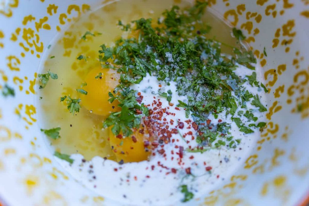 Eggs, cream, parsley and spices for carbonara