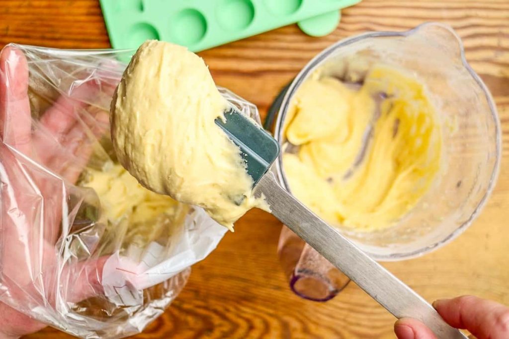 Fill cake batter into piping bags