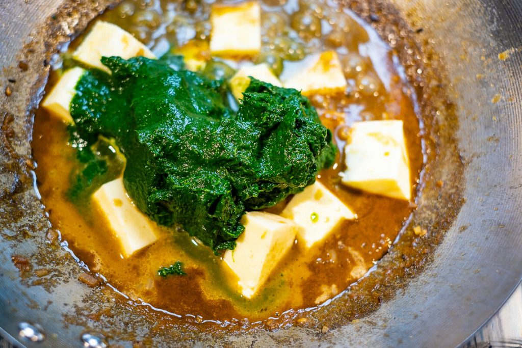 Add the spinach to the paneer
