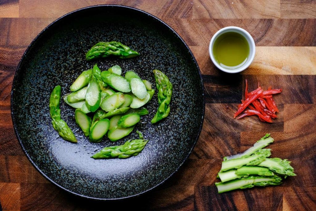 Serve green asparagus soup