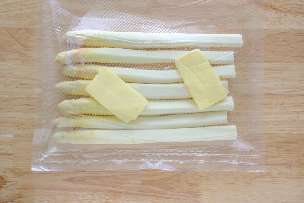 Asparagus with butter in bags