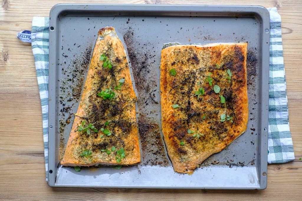 Grilled salmon on baking sheet