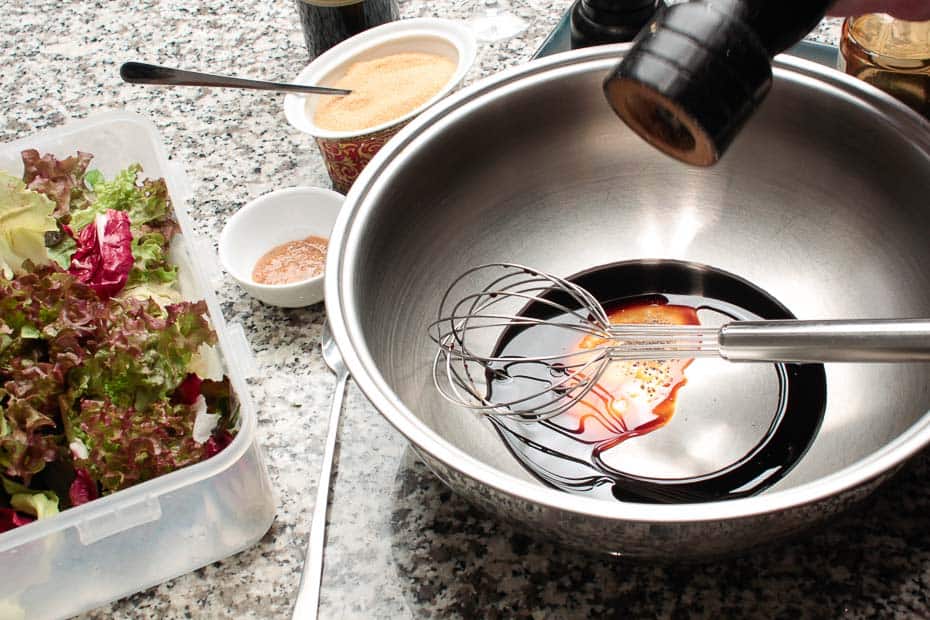 Prepare salad dressing or vinaigrette.