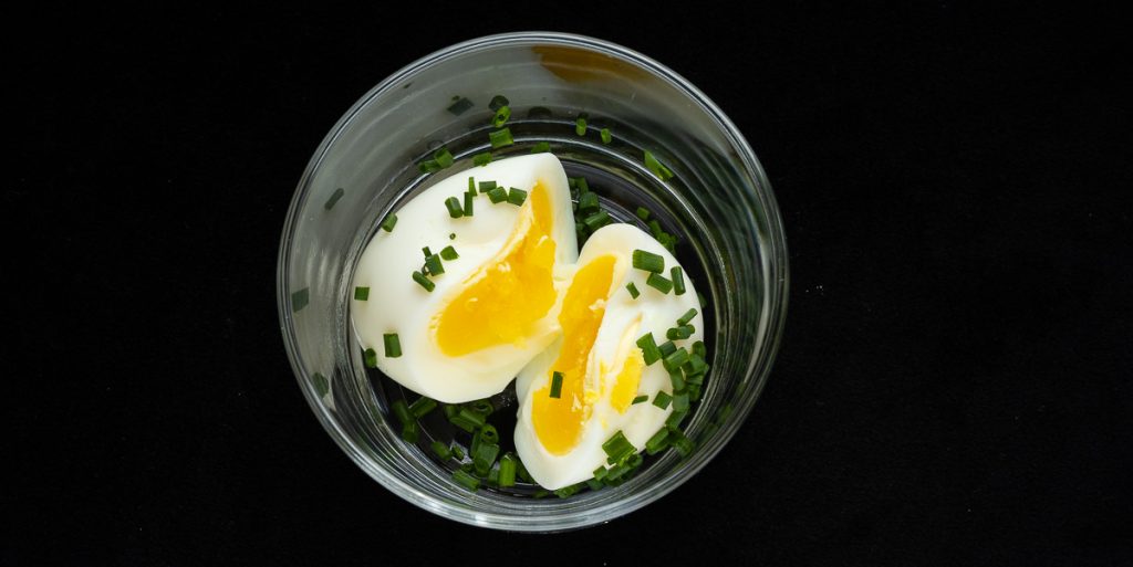 Eggs in glass with chives