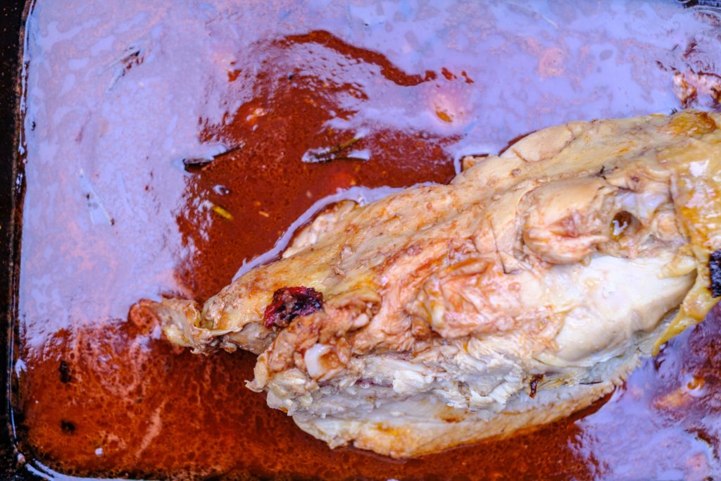 Chicken carcass in gravy