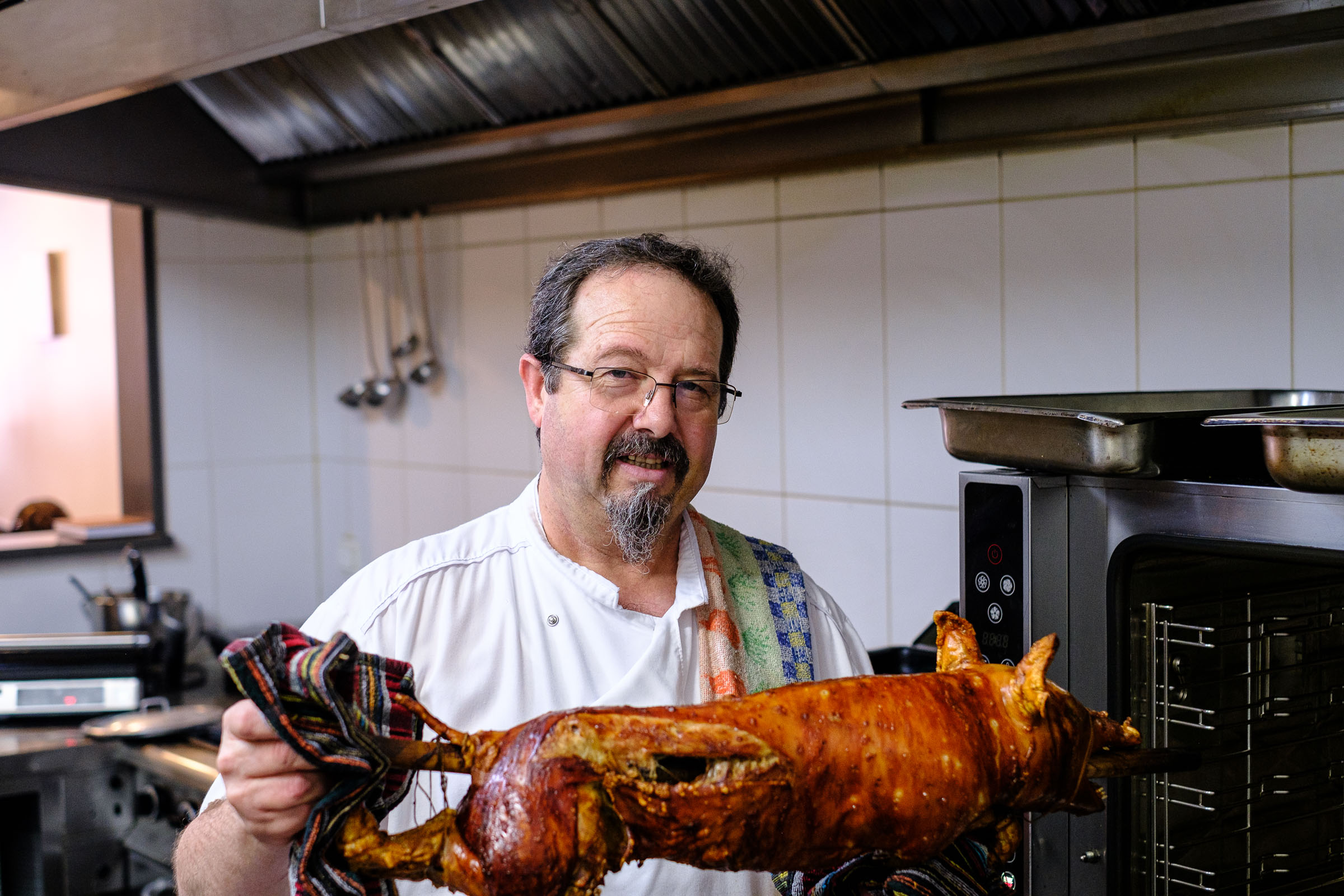 Cook Agostinho with the roast suckling pig
