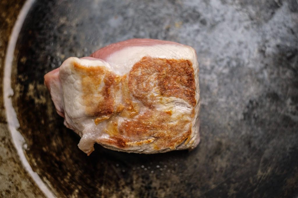 seared pork tenderloin piece