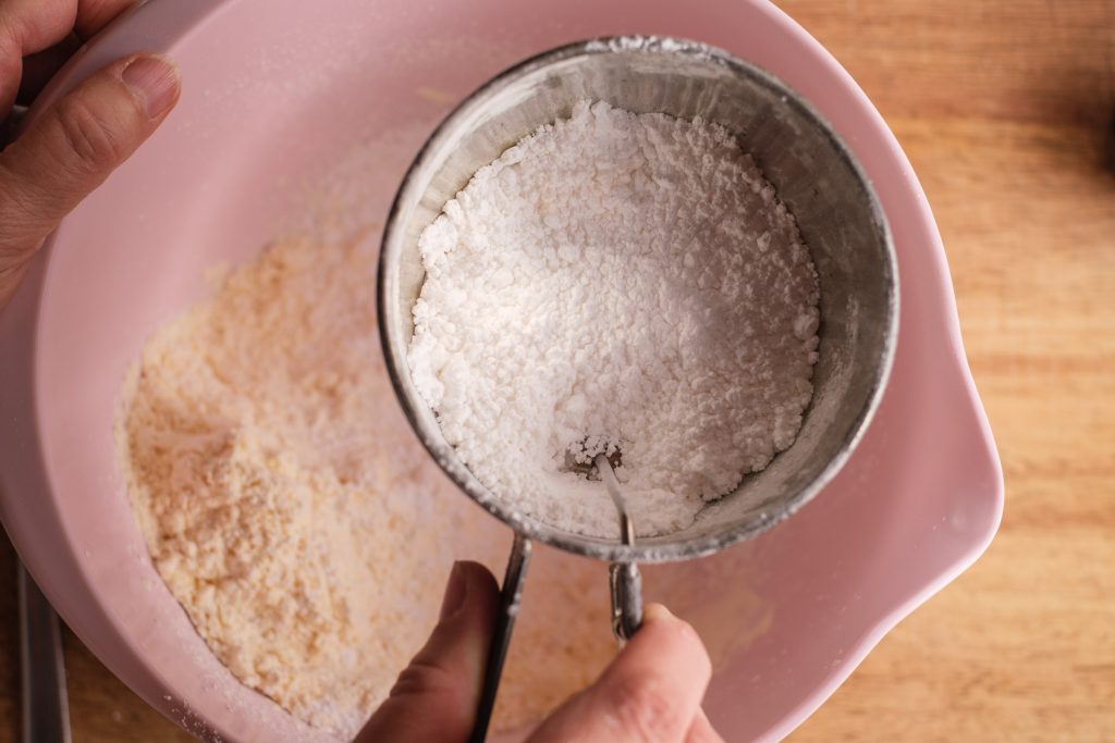 Sift powdered sugar
