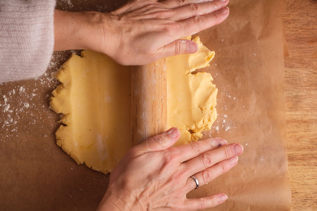 Roll out the shortcrust pastry on baking paper