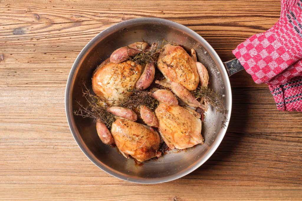 Roasted quail in pot