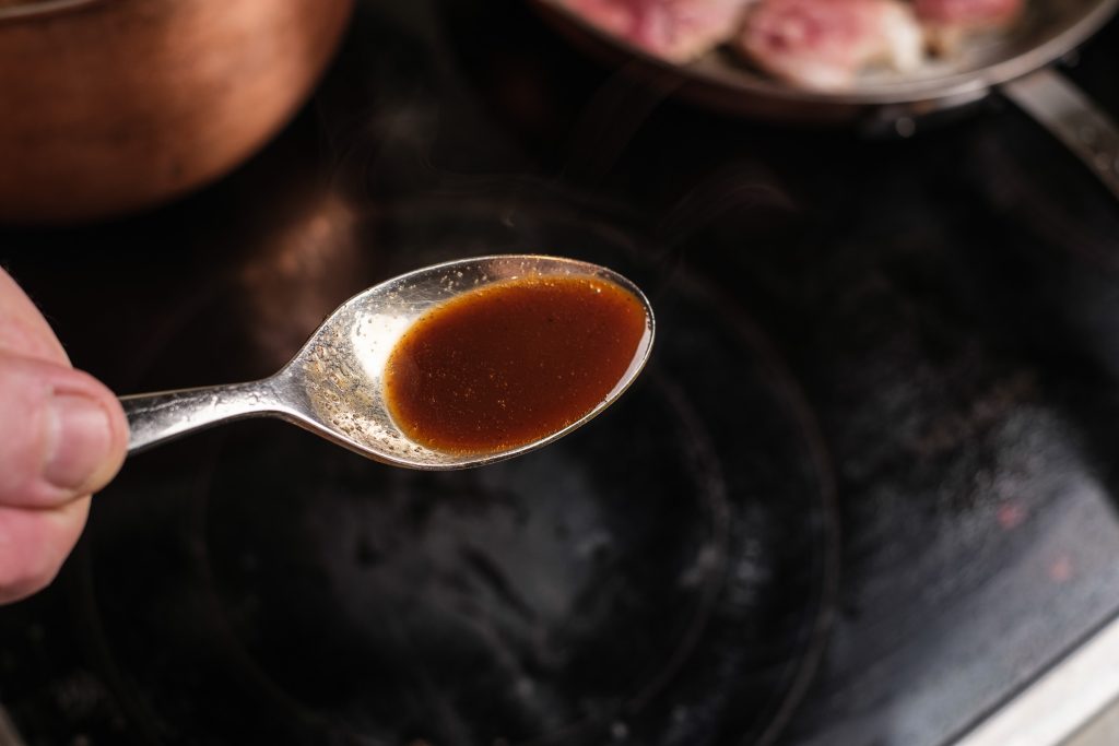 Quail sauce on spoon