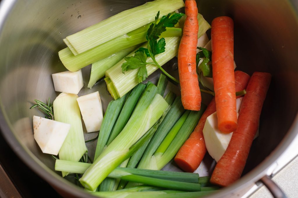 Soup vegetables for chicken broth in the pot
