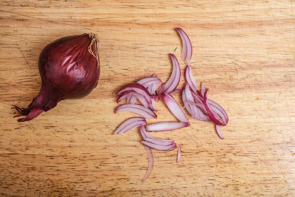 Cut red onions into strips