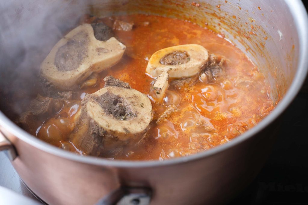 Add the marrow bones to the goulash soup