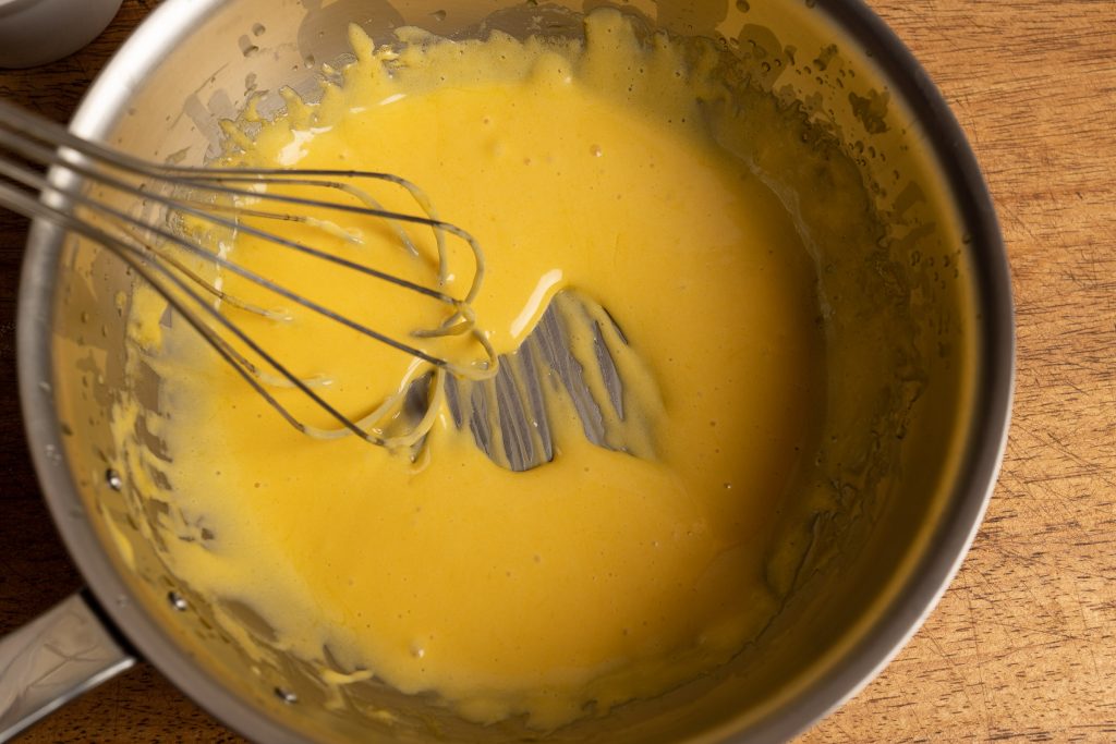 Whip the Bearnaise sauce in the copper pot