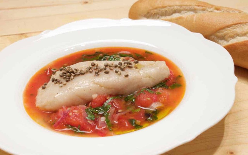Fisch in Tomatensauce Rezept Bild.